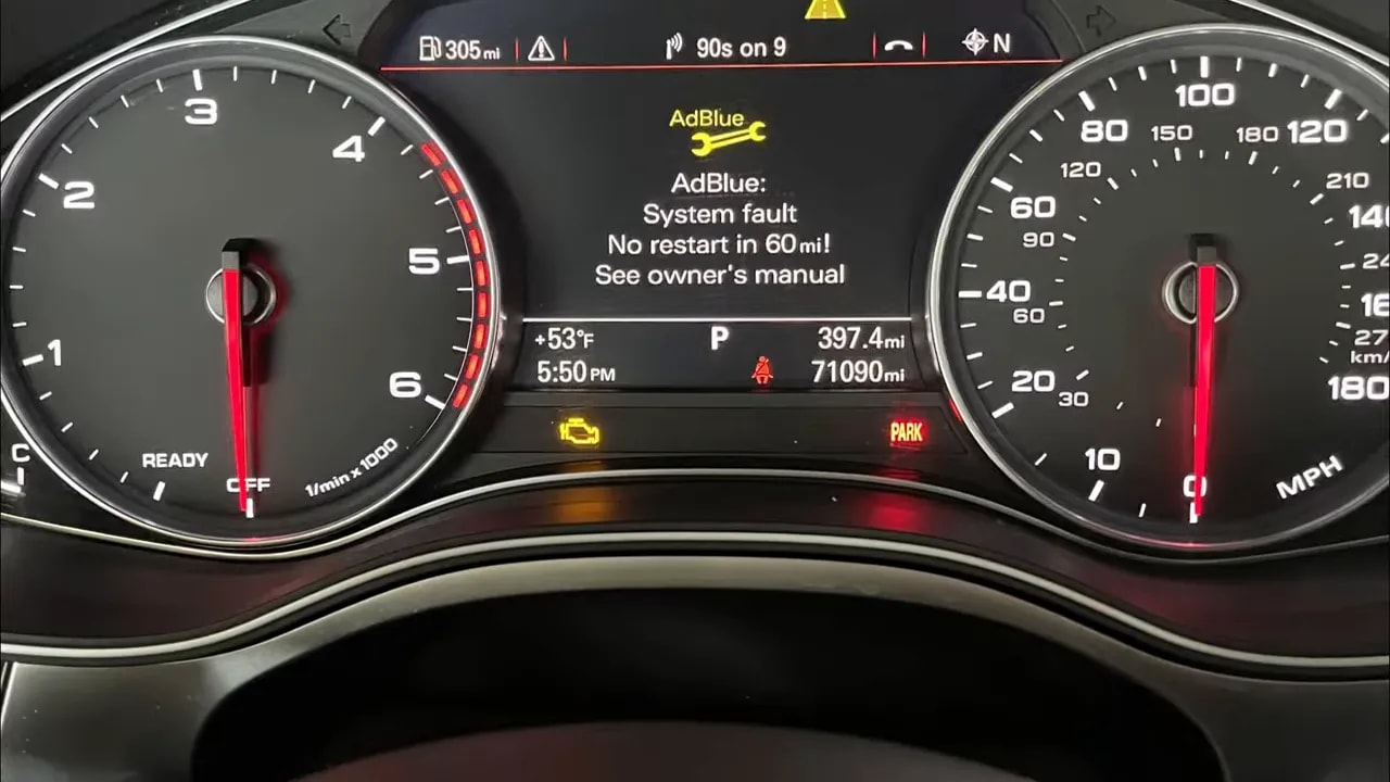 Instrument cluster displaying an AdBlue system fault and no restart warning at 850 miles