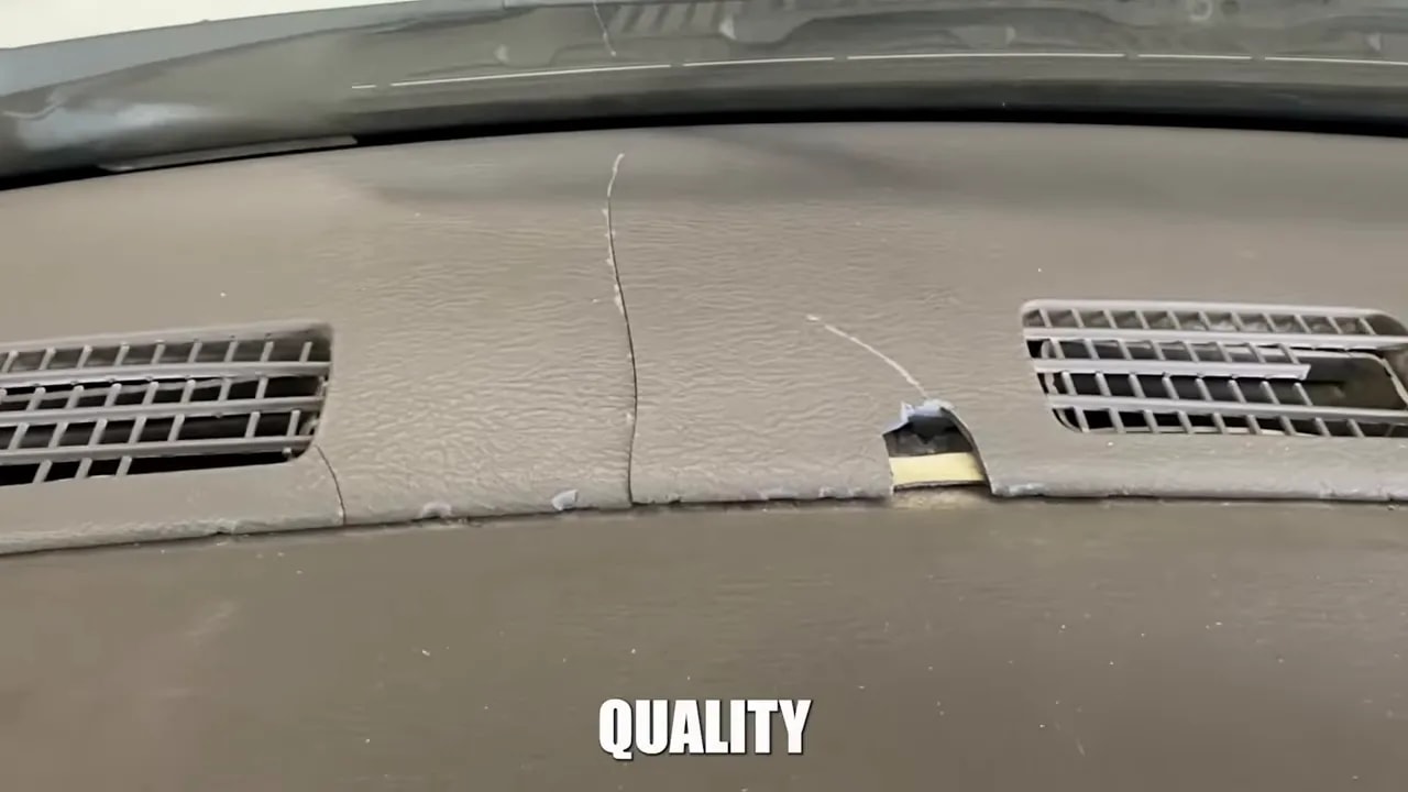 Truck dashboard with cracks across the upper surface near the vents
