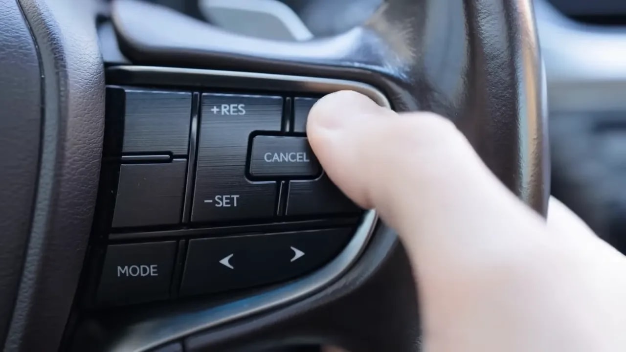 Steering-wheel cruise control buttons labeled RES, SET, and CANCEL