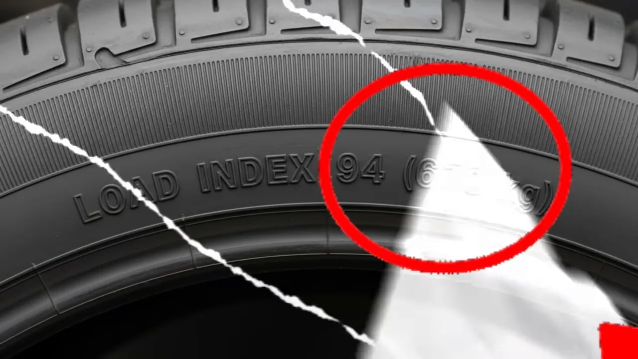 Tire sidewall graphic with load index 94 and 670 kg circled in red